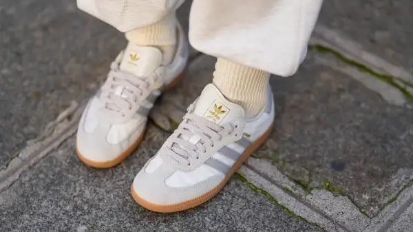 PARIS, FRANCE - OCTOBER 23: Diane Batoukina wears white socks, white Samba Adidas sneakers shoes, during a street style fashion photo session, on October 23, 2024 in Paris, France. (Photo by Edward Berthelot/Getty Images)