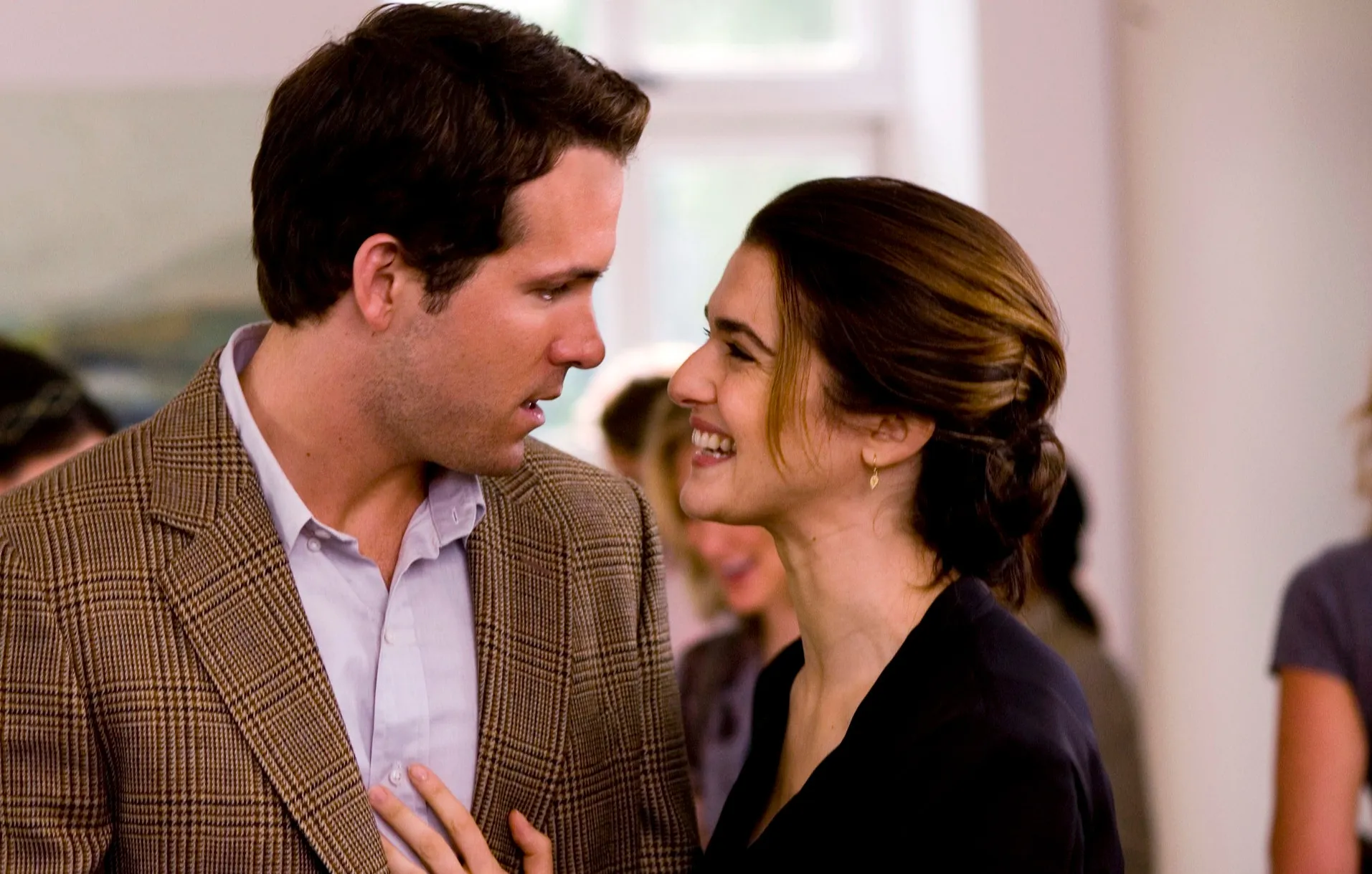 A woman smiles at a man in Definitely, Maybe.