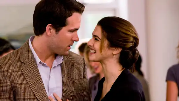 A woman smiles at a man in Definitely, Maybe.
