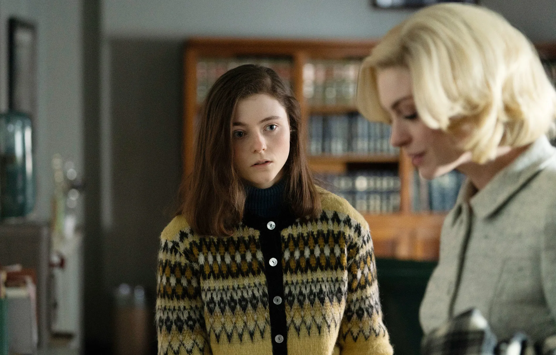 A girl looks at a woman in Eileen.