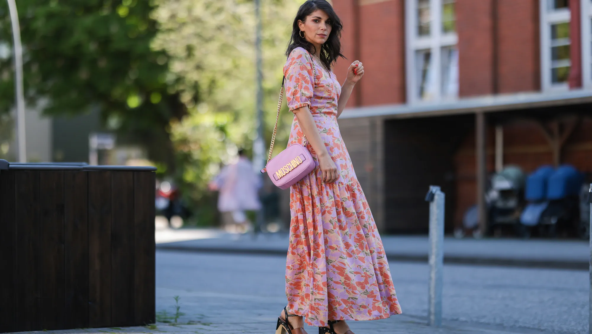 woman wearing floral pink maxi dress