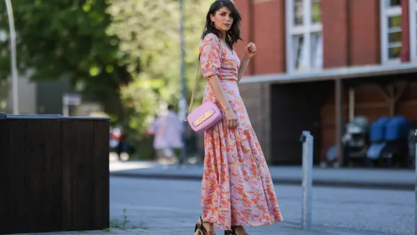 woman wearing floral pink maxi dress