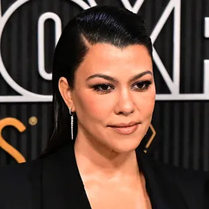 US socialite Kourtney Kardashian and husband US musician Travis Barker arrive for the 75th Emmy Awards at the Peacock Theatre at L.A. Live in Los Angeles on January 15, 2024. (Photo by Frederic J. Brown / AFP) (Photo by FREDERIC J. BROWN/AFP via Getty Images)