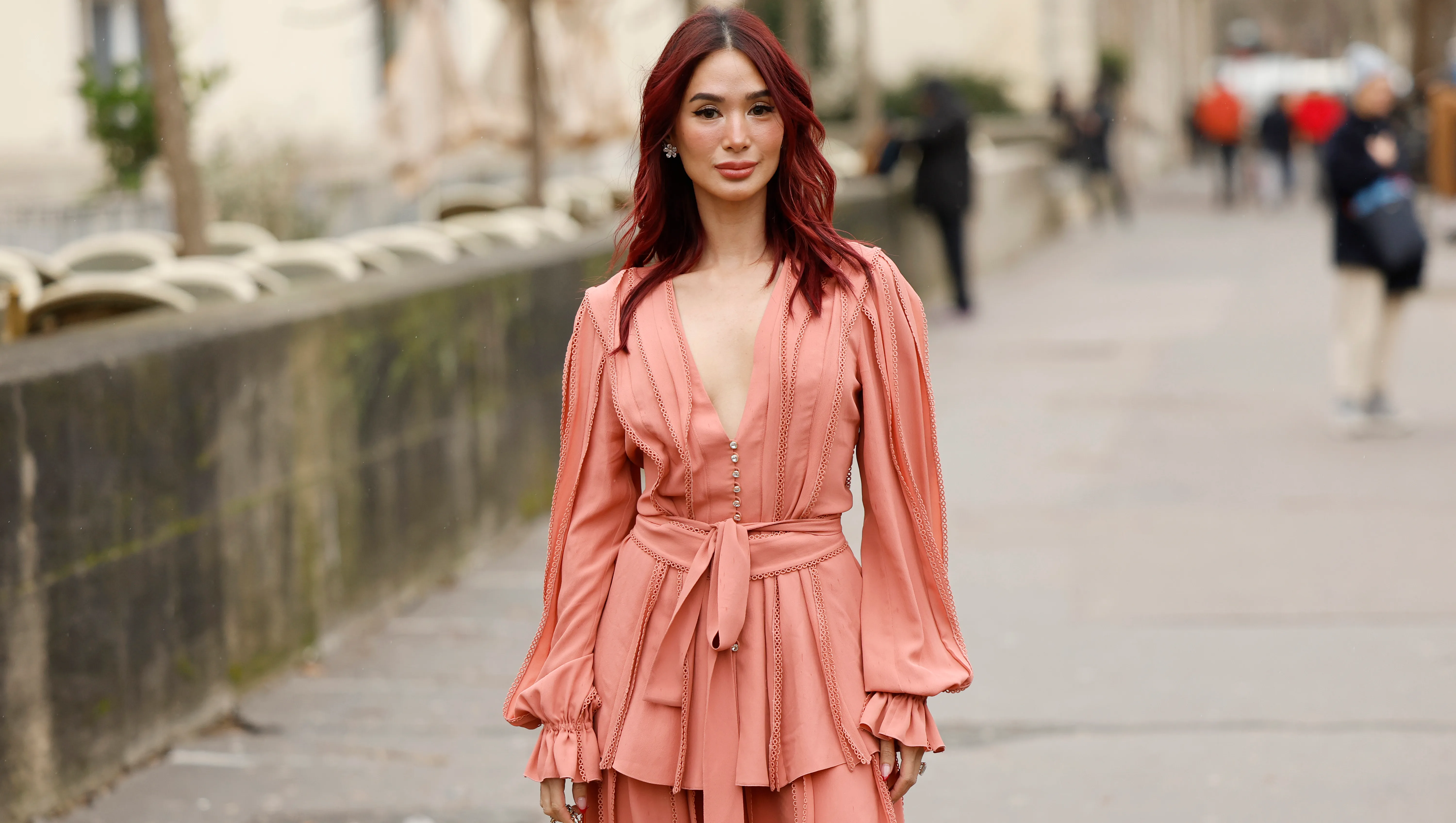 PARIS, FRANCE - JANUARY 29: Heart Evangelista wears a peach blouse with matching maxi skirt, crystal decorated bag, outside Elie Saab, during the Haute Couture Spring-Summer 2025 as part of Paris Fashion Week on January 29, 2025 in Paris, France. (Photo by Claudio Lavenia/Getty Images)
