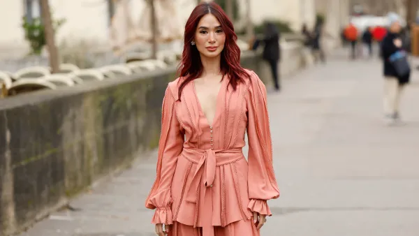 PARIS, FRANCE - JANUARY 29: Heart Evangelista wears a peach blouse with matching maxi skirt, crystal decorated bag, outside Elie Saab, during the Haute Couture Spring-Summer 2025 as part of Paris Fashion Week on January 29, 2025 in Paris, France. (Photo by Claudio Lavenia/Getty Images)