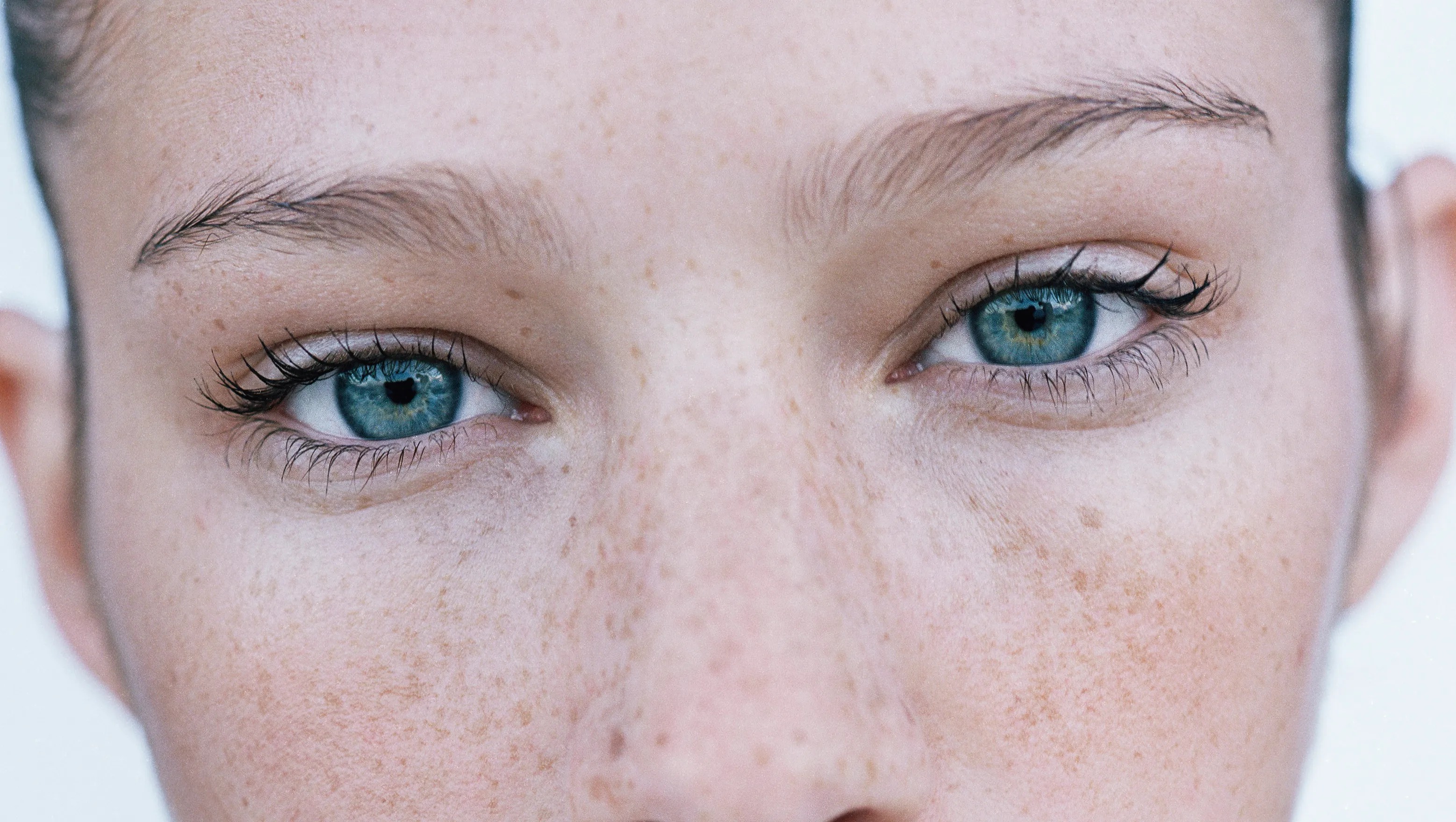 Young woman wearing red lipstick, portrait, close-up