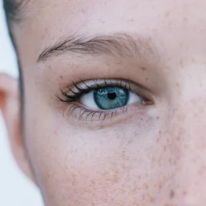 Young woman wearing red lipstick, portrait, close-up