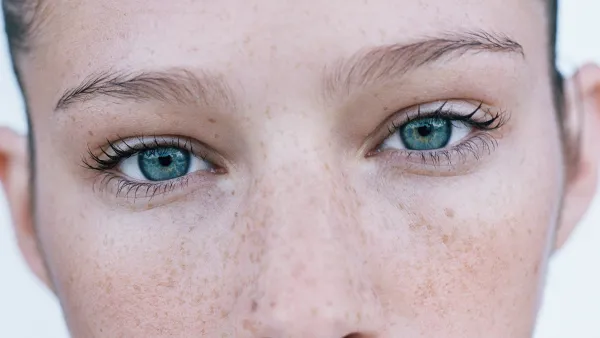 Young woman wearing red lipstick, portrait, close-up