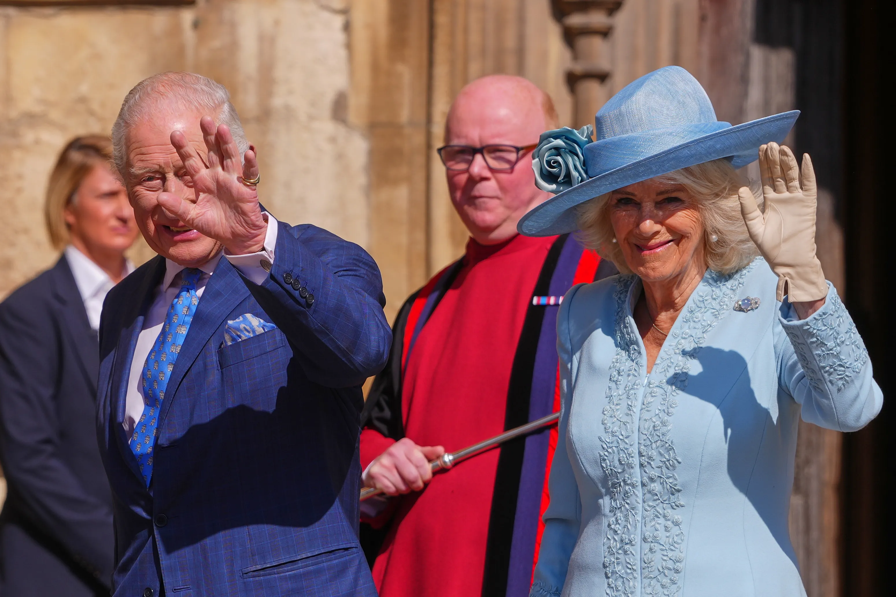 WINDSOR, ENGLAND - APRIL 20: Britain's King Charles III and Queen Camilla wave at the crowd as they arrive for the Easter Matins Service at St. George's Chapel, Windsor Castle on April 20, 2025 in Windsor, England. (Photo by Kirsty Wigglesworth - WPA Pool/Getty Images)