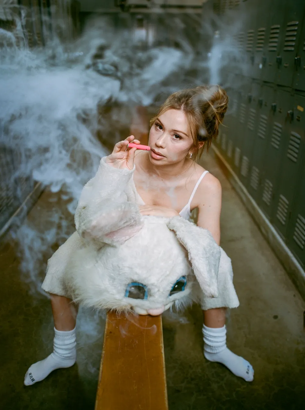 Gabby Windey Transforms Into a Sexy Cheerleader for Flower by Edie Parker Campaign