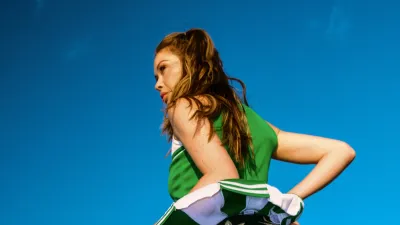 Gabby Windey Transforms Into a Sexy Cheerleader for Flower by Edie Parker Campaign