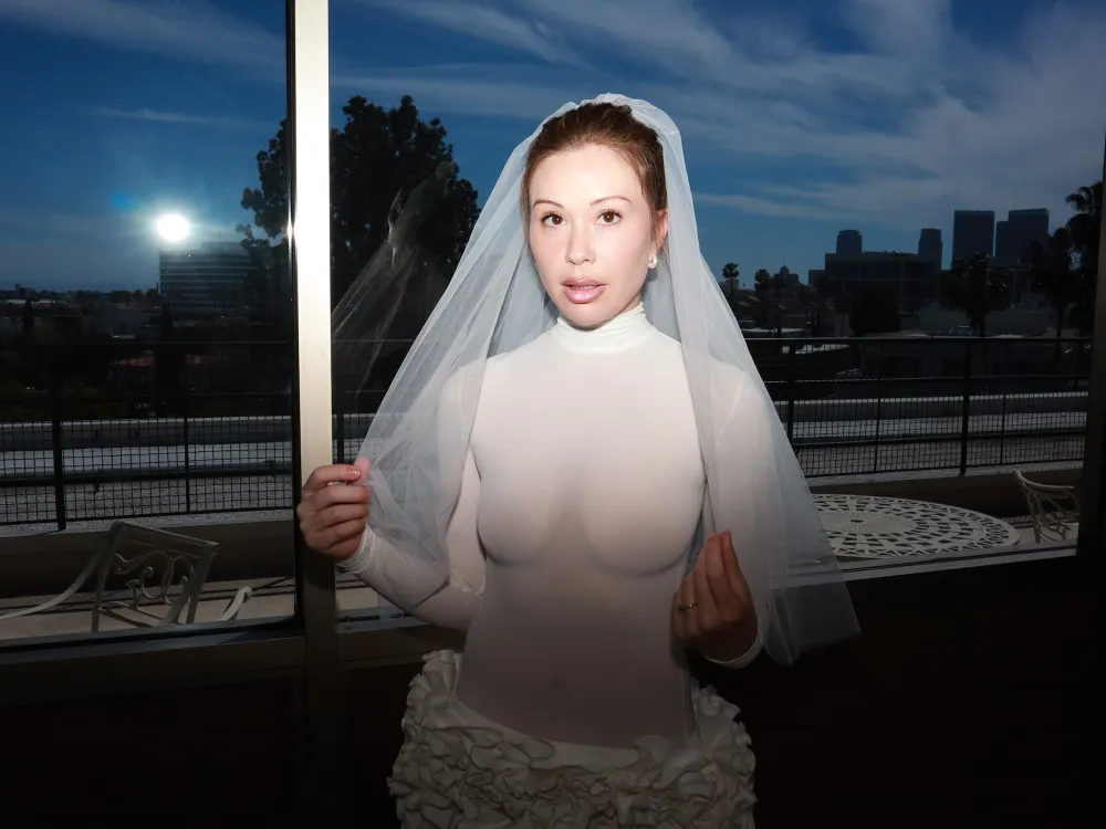 Gabby Windey Wows in Sheer Dress for Her Legal Wedding With Robby Hoffman