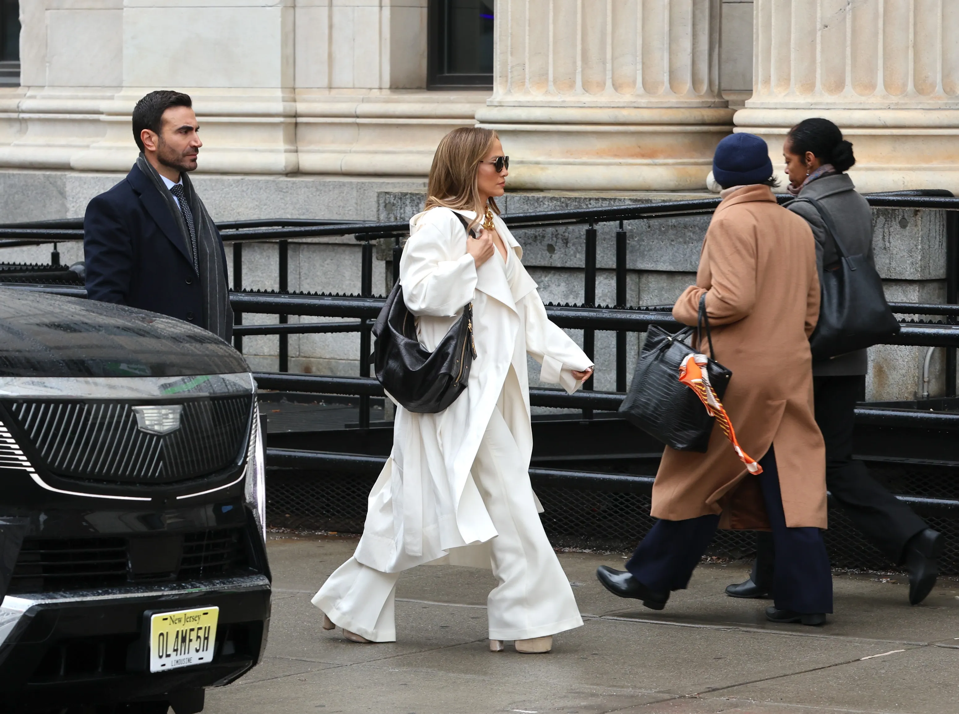 Brett Goldstein and Jennifer Lopez are seen filming on the "Office Romance" movie set on April 07, 2025 in Hoboken, New Jersey.