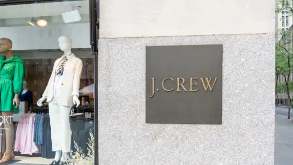 New York City, USA - August 21, 2022: A J.Crew store sign on the building is seen on Fifth Ave. in New York City, USA. J.Crew Group, Inc., is an American multi-brand, multi-channel, specialty retailer.