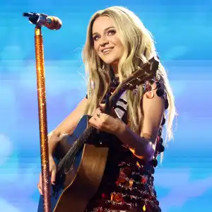 Kelsea Ballerini Accepts Bedazzed Boots From a Fan and Wears Them on Stage