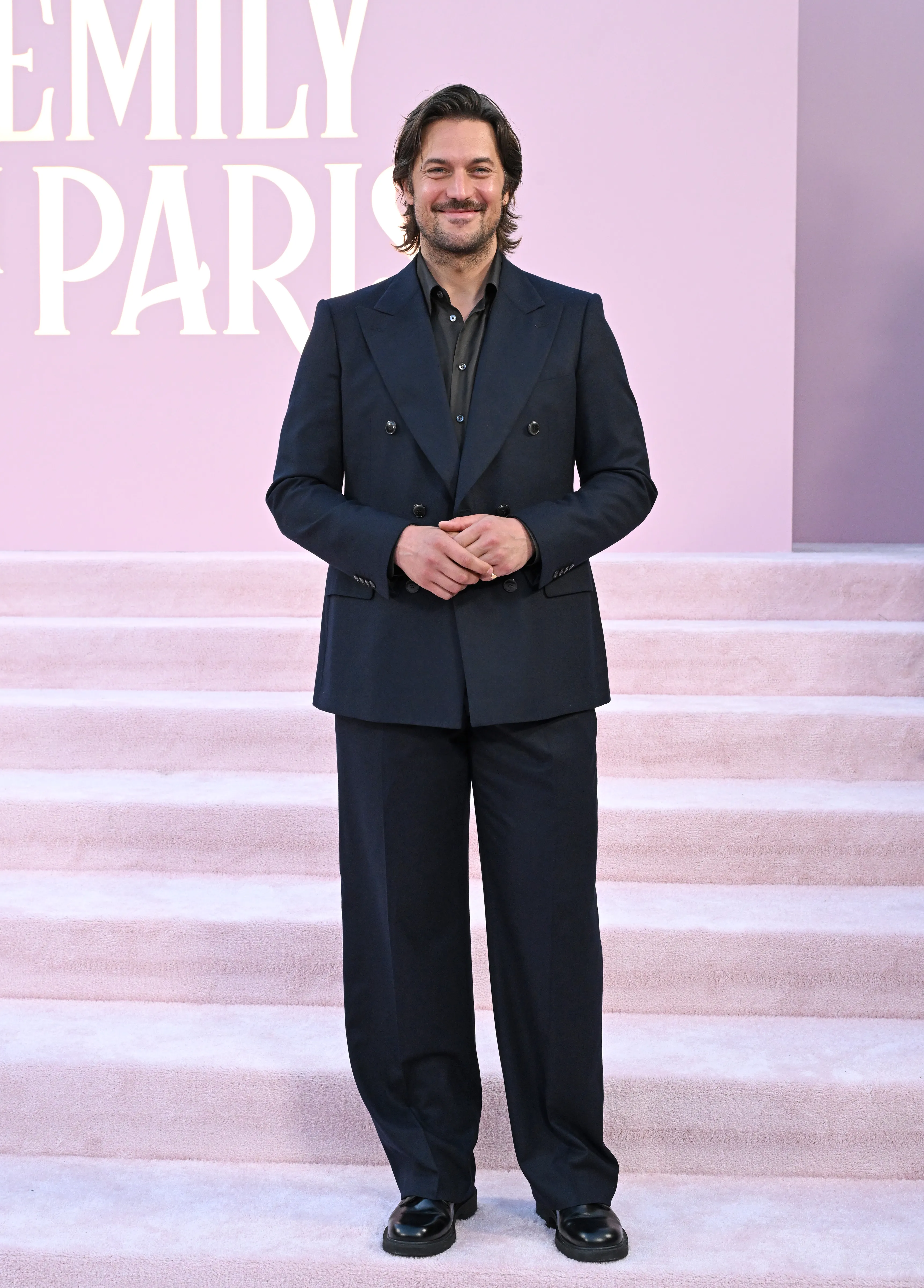 LOS ANGELES, CALIFORNIA - AUGUST 14: Lucas Bravo attends the Premiere of Netflix's "Emily in Paris" Season 4 Part 1 at The Egyptian Theatre Hollywood on August 14, 2024 in Los Angeles, California. (Photo by Axelle/Bauer-Griffin/FilmMagic)