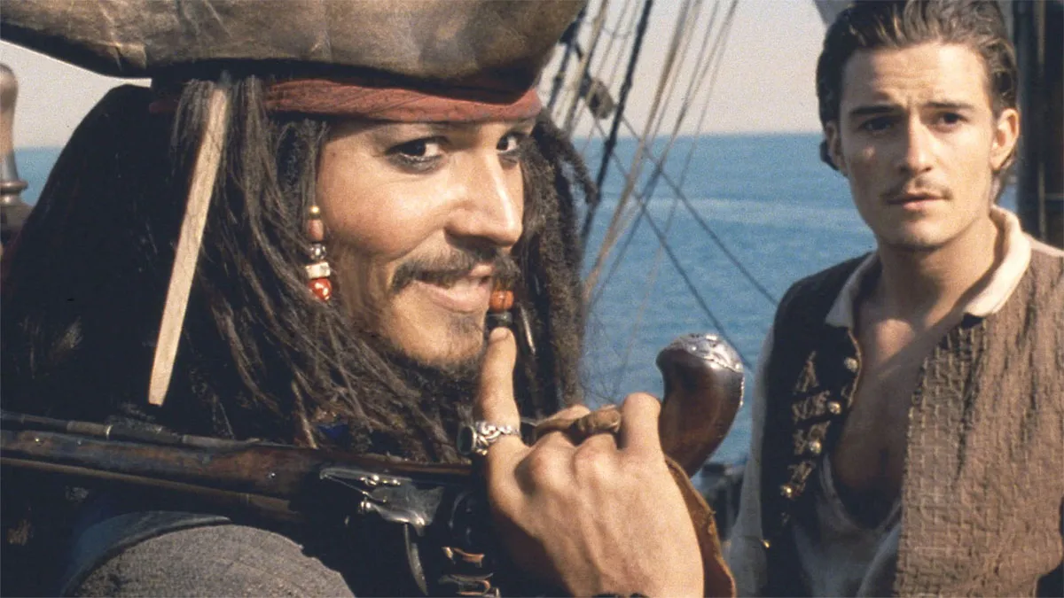 Johnny Depp and Orlando Bloom in Pirates of the Caribbean: The Curse of the Black Pearl.