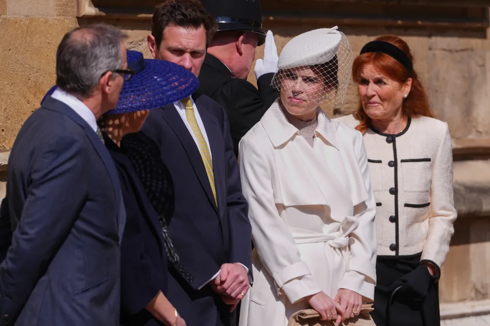 WINDSOR, ENGLAND - APRIL 20: Princess Eugenie, centre, with her mother Sarah Ferguson, right attend the Easter Matins Service at St. George's Chapel, Windsor Castle on April 20, 2025 in Windsor, England. (Photo by Kirsty Wigglesworth - WPA Pool/Getty Images)