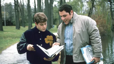 Sean Astin and Jon Favreau go over some notes in Rudy.