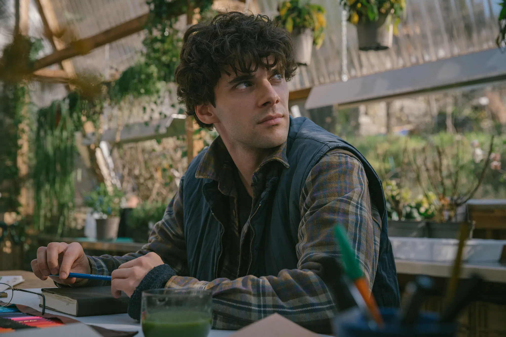 Álvaro Rico strikes a contemplative pose in The Gardener.