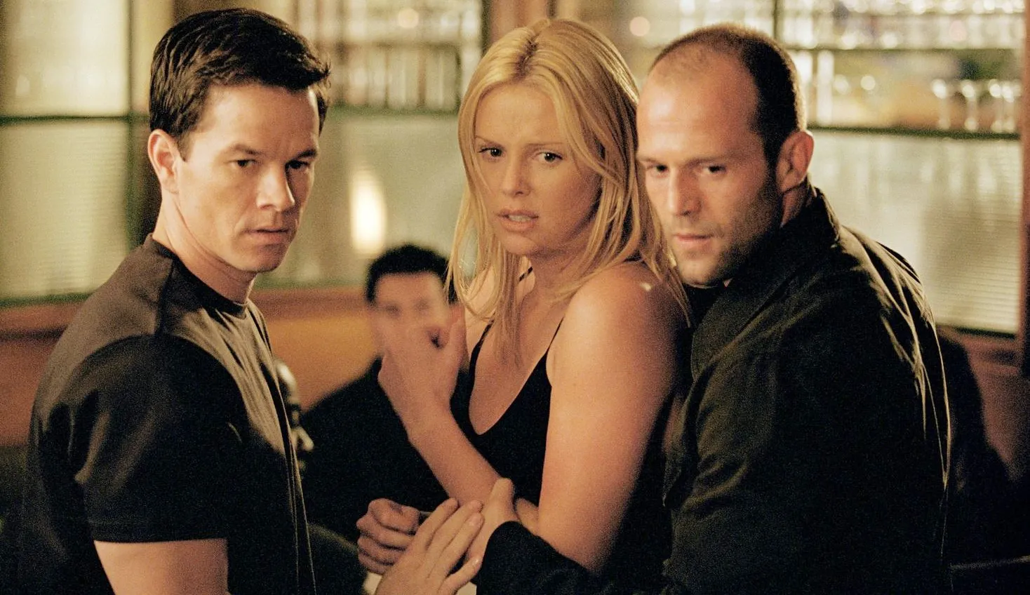 Three people look terrified in The Italian Job.