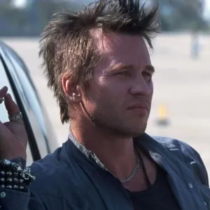 Val Kilmer looks to the side in The Salton Sea.