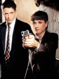 Two cops aim their guns in Copycat.