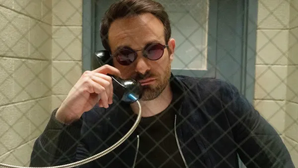 A man talks on a phone in Daredevil: Born Again.