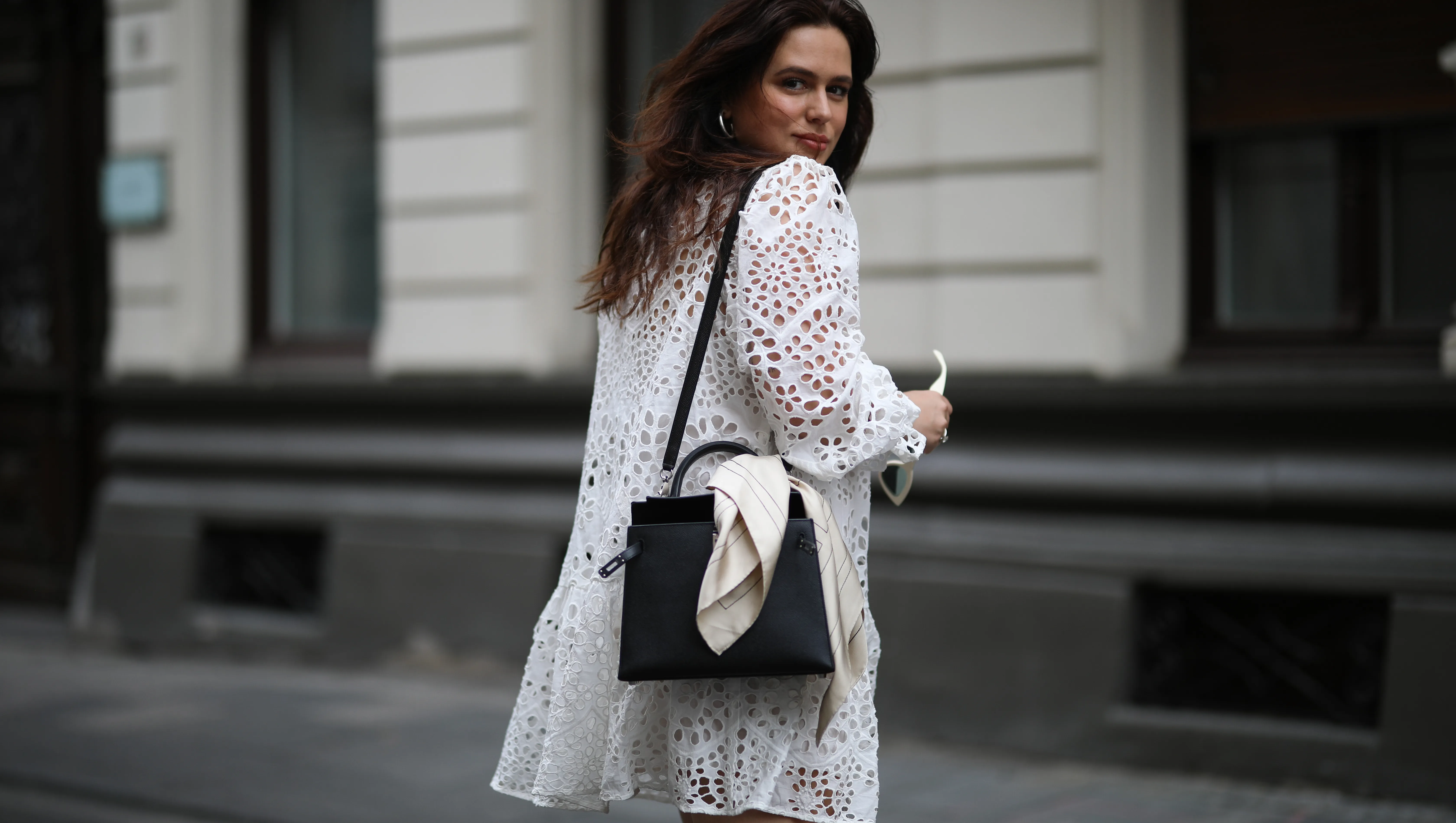 COLOGNE, GERMANY - AUGUST 14: Lou Beyer wearing Hermes bag, Prada boots and H&M dress on August 14, 2020 in Cologne, Germany. (Photo by Jeremy Moeller/Getty Images)