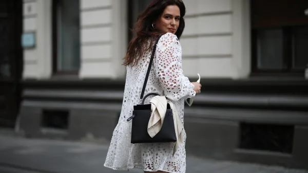 COLOGNE, GERMANY - AUGUST 14: Lou Beyer wearing Hermes bag, Prada boots and H&M dress on August 14, 2020 in Cologne, Germany. (Photo by Jeremy Moeller/Getty Images)