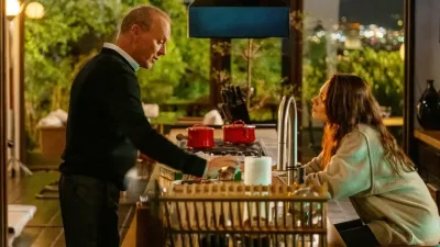 A man talks to a woman in Goodrich.