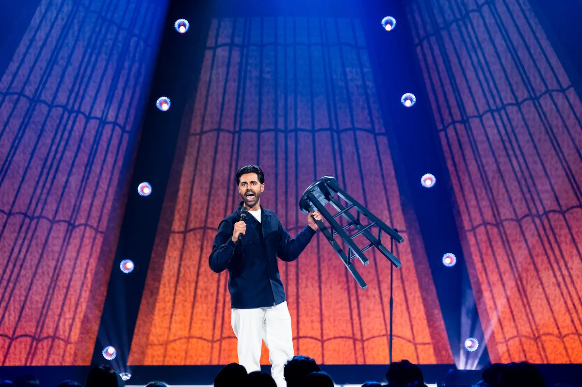 Hasan Minhaj onstage in 'Off With His Head.'