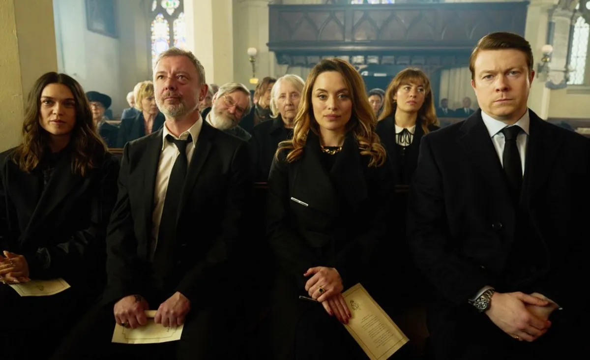 Mourners stand in a church in 'I, Jack Wright.'