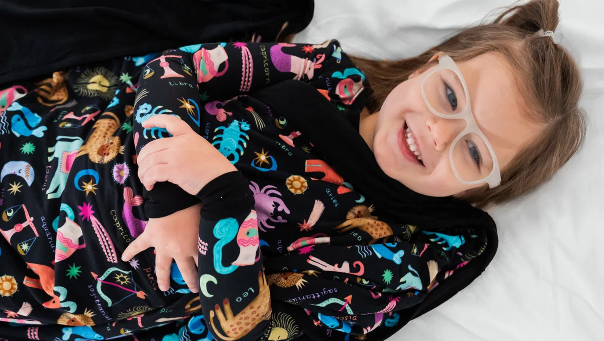 Parents Will Secretly Love Little Sleepies' Zodiac Pajama Collection More Than Their Kids