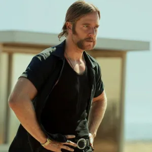 A man stares ahead in Mrs. Davis.