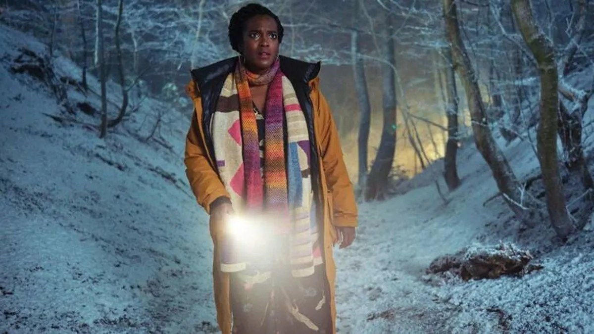 A woman shins a flashlight in Passenger.