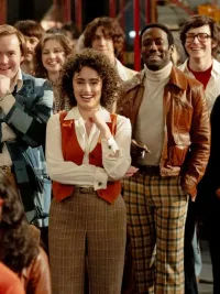 A group of people watch a skit in Saturday Night.