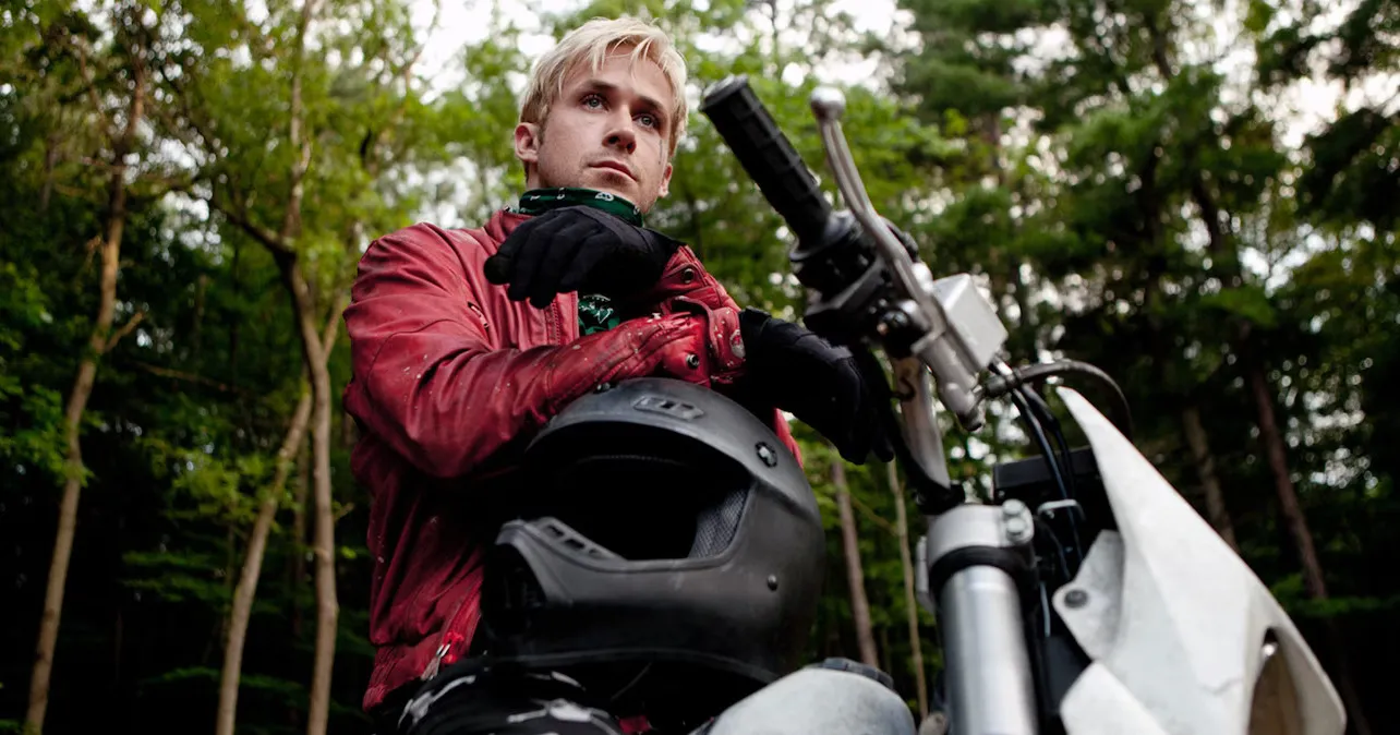 Ryan Gosling sits on a motorcycle in The Place Beyond the Pines.