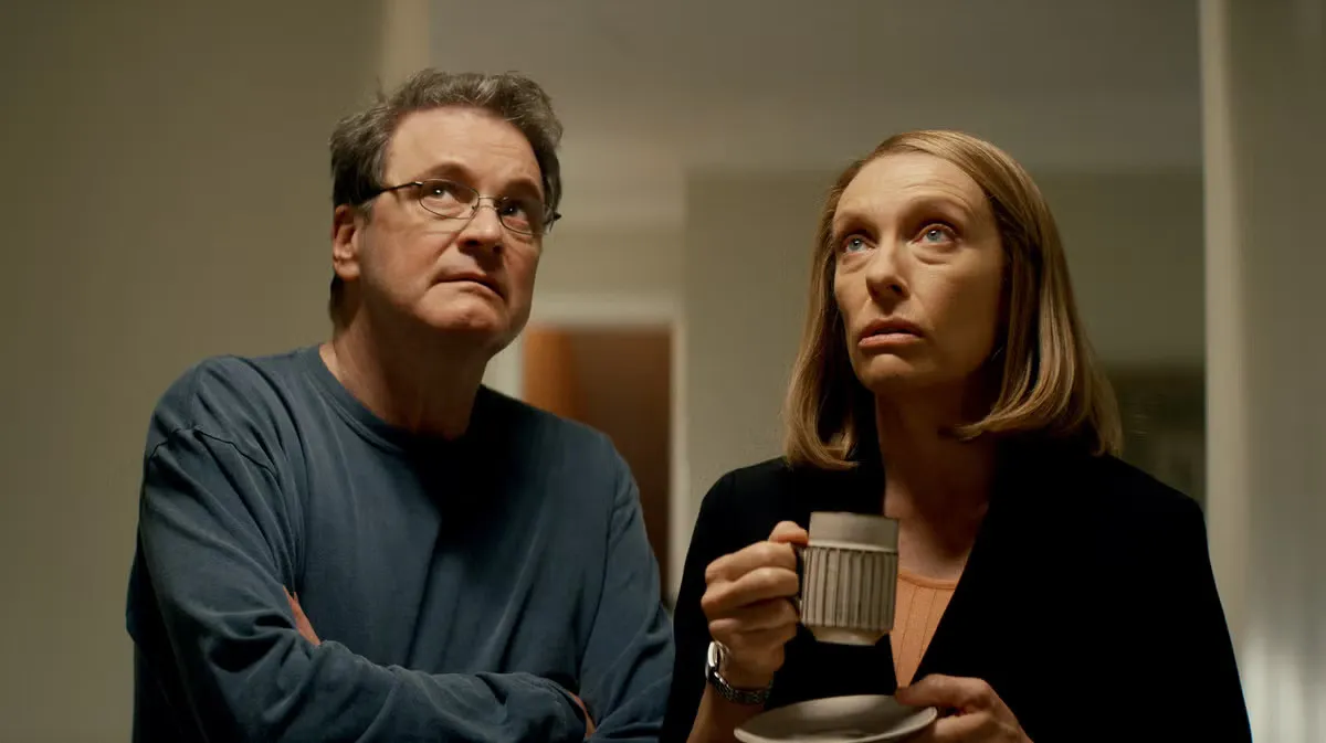 A couple look up in The Staircase.