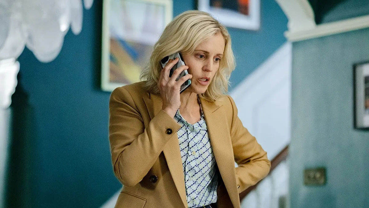 A woman talks on the phone in The Stolen Girl.