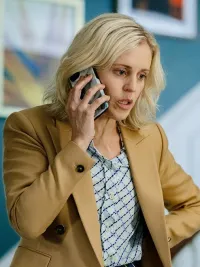 A woman talks on the phone in The Stolen Girl.