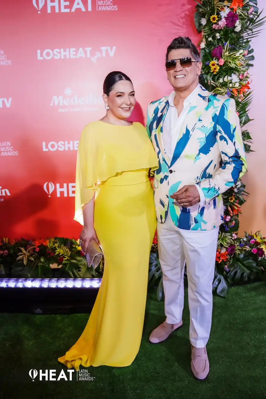 Eddye Herrera y su esposa en los Premios HEAT 2025