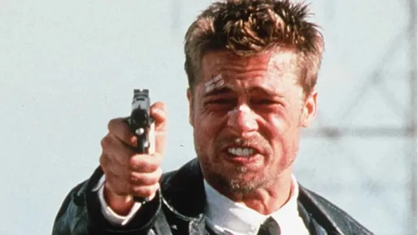 A man aims his gun in 'Seven.'