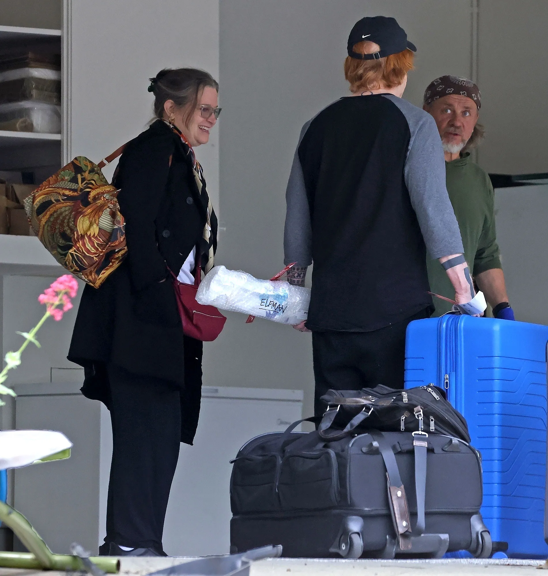 Bridget Fonda and Danny Elfman