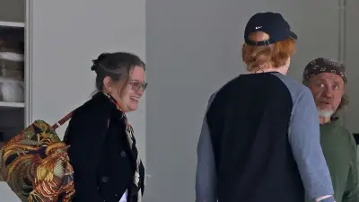 Bridget Fonda and Danny Elfman