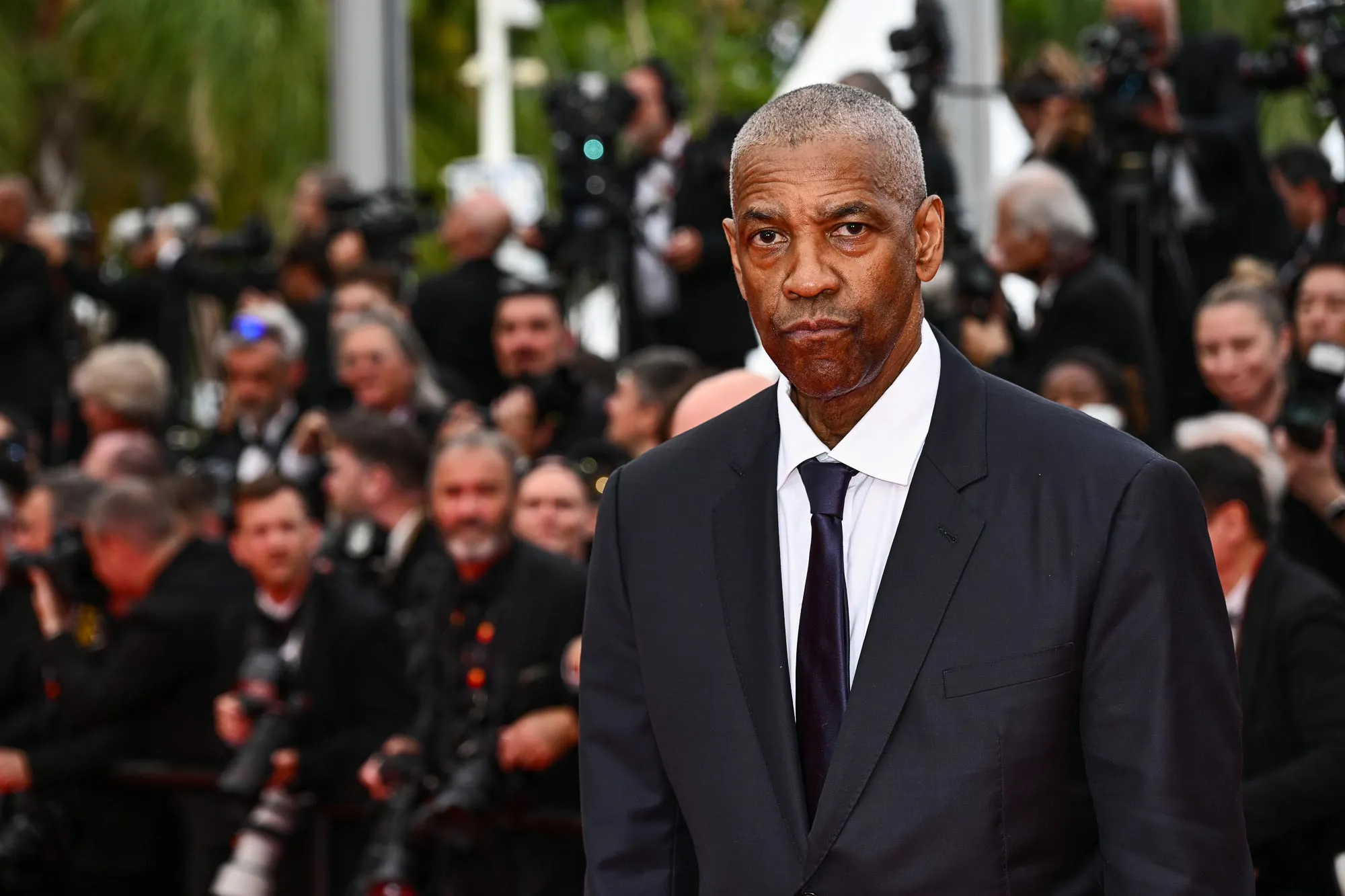 Denzel Washington attends the Highest 2 Lowest red carpet at the 78th annual Cannes Film Festival GettyImages 2215948903