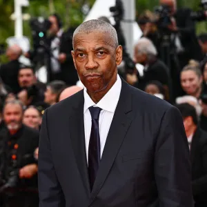 Denzel Washington attends the Highest 2 Lowest red carpet at the 78th annual Cannes Film Festival GettyImages 2215948903