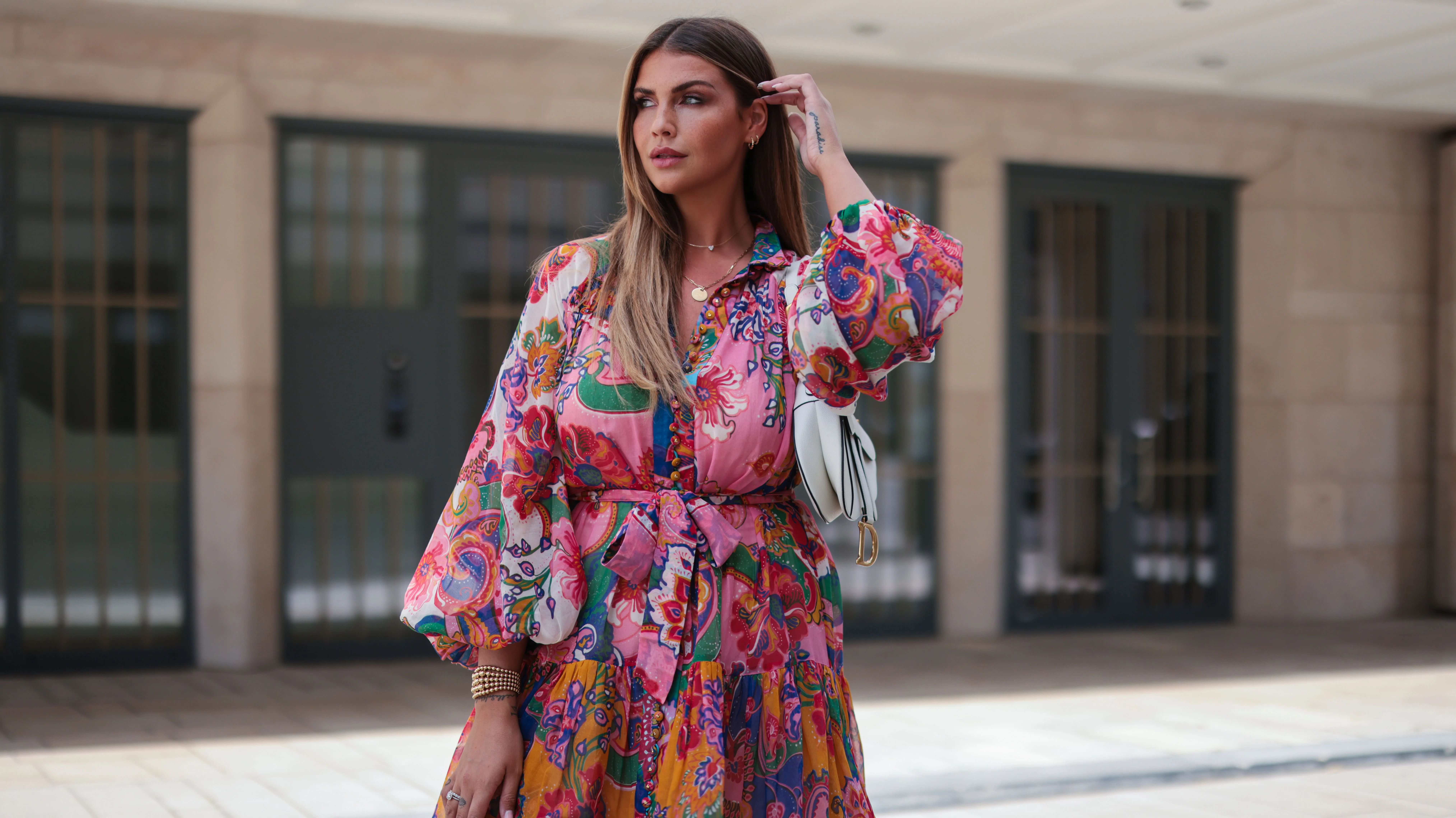 COLOGNE, GERMANY - JUNE 18: Farina Opoku wearing pink floral Zimmermann mini dress and white Dior saddle bag poses on June 18, 2021 in Cologne, Germany. (Photo by Jeremy Moeller/Getty Images)