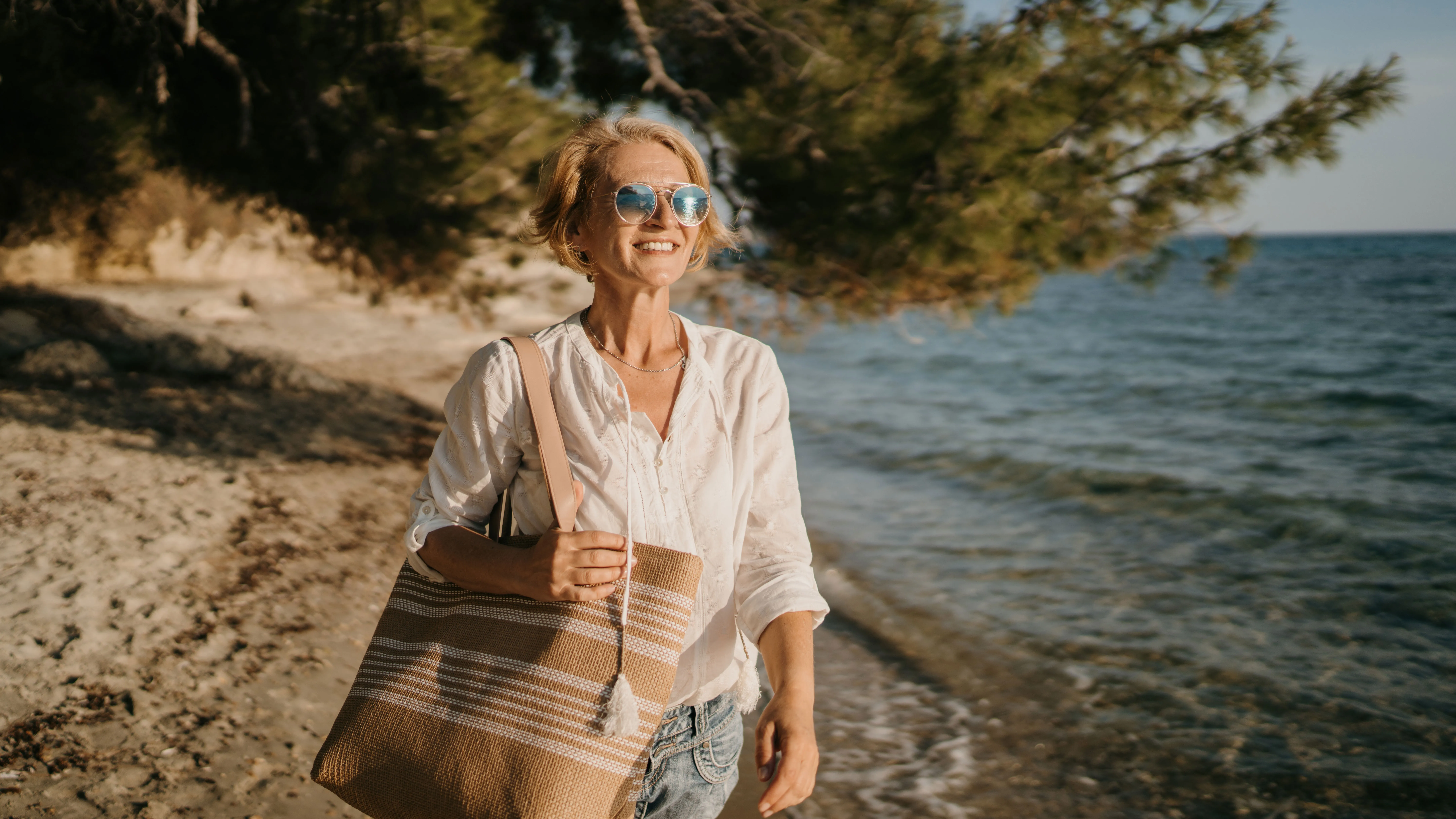Woman alone on vacation - stock photo