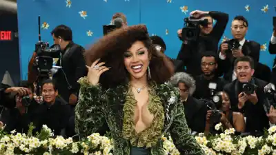 GettyImages-2213629102 cardi b details extravagant cost of raising three kids